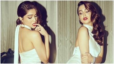 Sharvari Wagh for IIFA AWards 2022 channels inner Marilyn Monroe in ivory backless gown and bold red lips (Instagram) Sharvari Wagh for IIFA AWards 2022 channels inner Marilyn Monroe in ivory backless gown and bold red lips (Instagram)