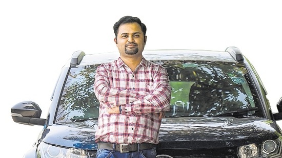 Ashwin Varkey with his Tata Nexon EV.
