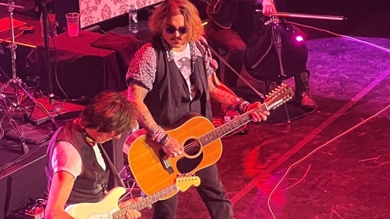 Johnny Depp joins musician Jeff Beck on stage during a concert, in Gateshead, Britain on June 2. (Lianne Templeman/via Reuters)(Lianne Templeman via REUTERS)