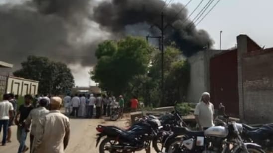 Multiple fire tenders present at spot in Hapur, Uttar Pradesh, where a huge explosion happened earlier today.(HT Photo)