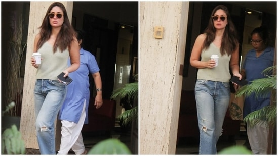 Kareena teamed the top with low waist mom jeans featuring an acid-washed light blue denim fabric, distressed details around the knees, pockets on the front, and a frayed hem with a flared detail.(HT Photo/Varinder Chawla)