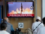People watch a TV screen showing a news program reporting about North Korea's missile launch with file image, at a train station in Seoul, South Korea, Sunday, North Korea test-fired a salvo of multiple short-range ballistic missiles toward the sea on Sunday, South Korea's military said, extending a provocative streak in weapons demonstrations this year that U.S. and South Korean officials say may culminate with a nuclear test explosion. People watch a TV screen showing a news program reporting about North Korea's missile launch with file image, at a train station in Seoul, South Korea, Sunday, North Korea test-fired a salvo of multiple short-range ballistic missiles toward the sea on Sunday, South Korea's military said, extending a provocative streak in weapons demonstrations this year that U.S. and South Korean officials say may culminate with a nuclear test explosion. 
