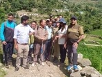 Chief Election Commissioner Rajeev Kumar treks 18kms to remote villages in Uttarakhand. Chief Election Commissioner Rajeev Kumar treks 18kms to remote villages in Uttarakhand.
