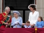 Britain's Prince Charles, left, with Queen Elizabeth II, Prince Louis her great-grandson, next to his mother Kate Duchess of Cambridge and Princess Charlotte her daughter, at right, stand on the balcony of Buckingham Palace, London.