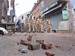 Police conduct a flag march in a locality after clashes broke out between two groups over market shutdown in Kanpur. Police conduct a flag march in a locality after clashes broke out between two groups over market shutdown in Kanpur. 