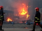 Firefighters arrive at the site after a fire broke out at a container storage facility in Sitakunda, about 40 km (25 miles) from the key port of Chittagong.(AFP) Firefighters arrive at the site after a fire broke out at a container storage facility in Sitakunda, about 40 km (25 miles) from the key port of Chittagong.(AFP)