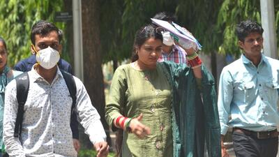 Candidates coming out of the examination centre in Sector 16, Chandigarh, after appearing in the UPSC Civil Services Prelims exam on a sweltering Sunday. (Keshav Singh/HT)