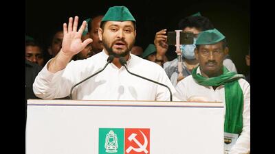 RJD leader Tejashwi Yadav addresses a gathering during the Grand Alliance Representative meeting in Patna on Sunday. (Santosh Kumar/HT Photo) RJD leader Tejashwi Yadav addresses a gathering during the Grand Alliance Representative meeting in Patna on Sunday. (Santosh Kumar/HT Photo)