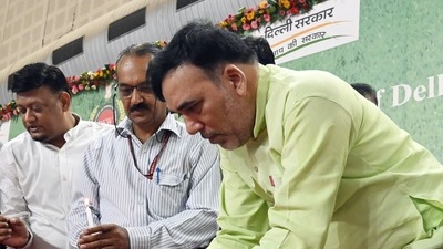 Delhi Environment Minister Gopal Rai lights a lamp at the launch of 'Harit Utsav' on the occasion of World Environment Day, in New Delhi on Sunday. (ANI Photo)
