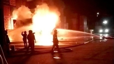 Firefighters try to containe the blaze at a container facilty in Sitakunda, Bangladesh in this screen grab obtained from a video on social media . Oliur Rahman via Facebook/via REUTERS