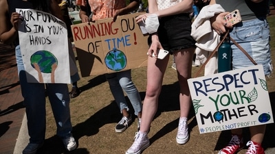 Demonstrators outside the White House on Earth Day demand immediate action on climate change. (Image for representation/Bloomberg) Demonstrators outside the White House on Earth Day demand immediate action on climate change. (Image for representation/Bloomberg)