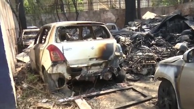 Jammu: Vehicles parked at Satwari Police Station gutted in fire that broke out last night. (ANI)