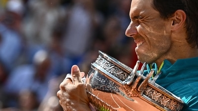 Rafael Nadal poses with The Musketeers' Cup after winning the French Open 2022 (AFP) Rafael Nadal poses with The Musketeers' Cup after winning the French Open 2022 (AFP)