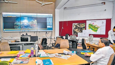 Uttarakhand chief minister Pushkar Dhami at the Disaster Control Room at the State Secretariat, to monitor the situation after the bus accident in Uttarkashi, in Dehradun on Sunday. (PTI) Uttarakhand chief minister Pushkar Dhami at the Disaster Control Room at the State Secretariat, to monitor the situation after the bus accident in Uttarkashi, in Dehradun on Sunday. (PTI)