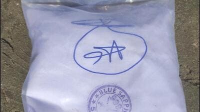 The words ‘Café Gourmet’ and ‘Blue Sapphire 555’ are printed on the packets containing the drugs seized at Gujarat’s Jakhau port . (HT PHOTO.)