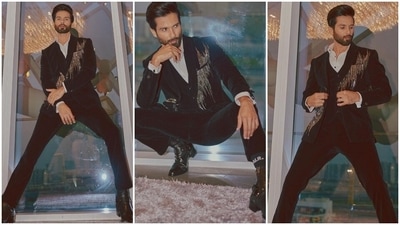 In the end, Shahid opted for a sleek side-parted and back swept hairdo, black ankle-length boots with matching socks, trimmed beard and glowing skin to round off his look for the IIFA Awards ceremony. Additionally, Shahid paid a tribute to Bappi Lahiri, who passed away earlier this year, at the awards show. (Instagram) In the end, Shahid opted for a sleek side-parted and back swept hairdo, black ankle-length boots with matching socks, trimmed beard and glowing skin to round off his look for the IIFA Awards ceremony. Additionally, Shahid paid a tribute to Bappi Lahiri, who passed away earlier this year, at the awards show. (Instagram)