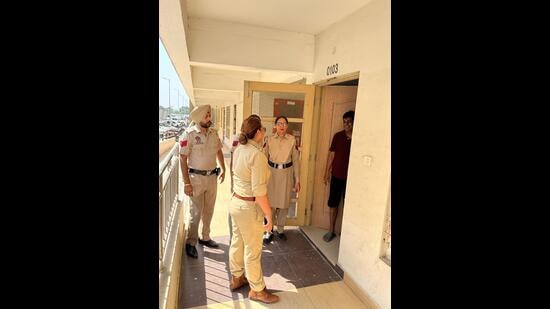 As many as 95 police personnel went around 300 flats at Purab Premium Apartments in Sector 88, Mohali, for inspections from 6.30 am till 10.30 am on Sunday. (HT Photo)