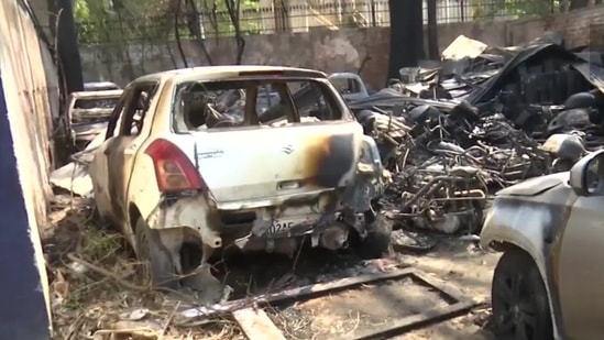 Jammu: Vehicles parked at Satwari Police Station gutted in fire that broke out last night.(ANI)