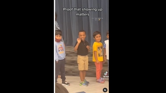 The little boy's face lit up when he saw his family in the audience. (mskadii__/Instagram)