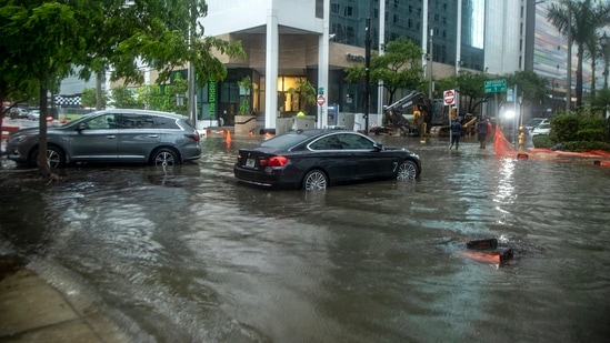Rainfall from Tropical Storm Alex floods the Brickell area near downtown Miami, Saturday.(Miami Herald via AP)