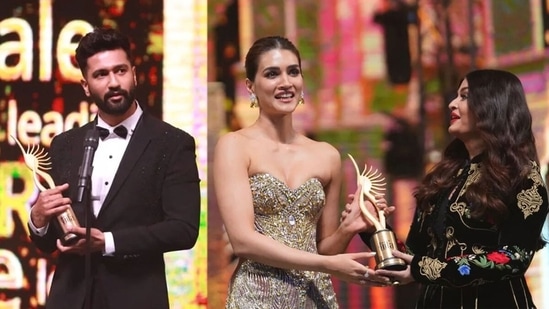 Vicky Kaushal and Kriti Sanon with their IIFA awards.&nbsp;