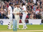 England's Joe Root, left, and England's Ben Foakes speak with New Zealand's Kane Williamson England's Joe Root, left, and England's Ben Foakes speak with New Zealand's Kane Williamson 