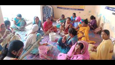 Women SHG members busy making moonj grass products in Prayagraj. (HT File) Women SHG members busy making moonj grass products in Prayagraj. (HT File)