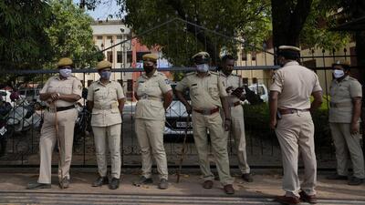 Panchayat officials of a village in Karnataka’s Udupi district with a help of police removed a signboard naming an interior road after Nathuram Godse on Monday after protests from Youth Congress workers. (AP) Panchayat officials of a village in Karnataka’s Udupi district with a help of police removed a signboard naming an interior road after Nathuram Godse on Monday after protests from Youth Congress workers. (AP)