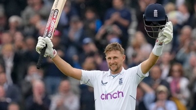 England's Joe Root celebrates scoring his century (100 runs) during the fourth day of the test match between England and New Zealand&nbsp; (AP)