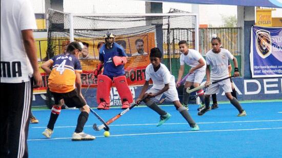 It is Friends Club Roomi ’s maiden victory in the Olympian Prithipal Singh Hockey Festival held in Ludhiana. (HT PHOTO)