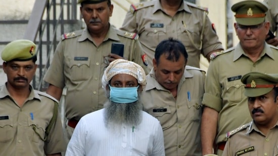 Waliullah Khan, the convict in the 2006 Varanasi serial blasts case, being brought to the Ghaziabad district and sessions court on Monday. (ANI) Waliullah Khan, the convict in the 2006 Varanasi serial blasts case, being brought to the Ghaziabad district and sessions court on Monday. (ANI)
