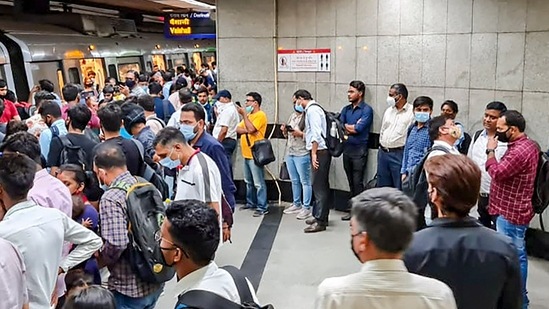 Commuters wait in a queue to board a Metro at a platform inside Mandi House station. (PTI file) Commuters wait in a queue to board a Metro at a platform inside Mandi House station. (PTI file)