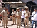 Police personnel stand guard at the Parade Chauraha area for the fourth consecutive day after violence broke out between two groups on June 3rd, in Kanpur. (ANI Photo) Police personnel stand guard at the Parade Chauraha area for the fourth consecutive day after violence broke out between two groups on June 3rd, in Kanpur. (ANI Photo)