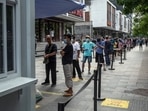Residents queue at a Covid-19 testing facility in Beijing, China.