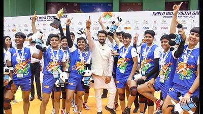 Union minister Anurag Singh Thakur with the girl’s kabbadi team of Haryana at the 4th Khelo India Youth Games in Panchkula on Tuesday. (PTI)
