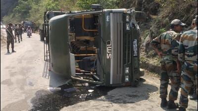 The army van that toppled near Tunnuhatti, 24km from Dalhousie town, in Chamba district on Tuesday morning. (HT Photo)
