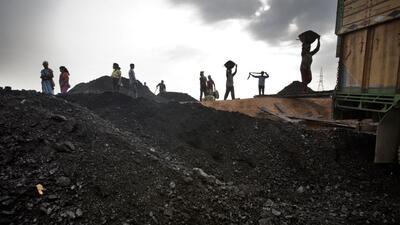 MEGHALAYA,INDIA - APRIL 30: Laborers load a truck with coal at coal depot in Jaintia Hills, Meghalaya in India on April 30, 2014. Indian government announced in September that it would double the coal production to one billion tons over the next four years to ease the ongoing power shortages. (Photo by Kuni Takahashi/Getty Images) (Getty Images) MEGHALAYA,INDIA - APRIL 30: Laborers load a truck with coal at coal depot in Jaintia Hills, Meghalaya in India on April 30, 2014. Indian government announced in September that it would double the coal production to one billion tons over the next four years to ease the ongoing power shortages. (Photo by Kuni Takahashi/Getty Images) (Getty Images)