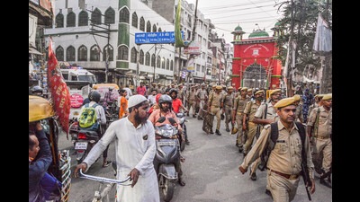Security personnel patrol to maintain law and order as shops are reopened after violence following a controversial remark by suspended BJP leader Nupur Sharma, in Kanpur on Tuesday. (PTI) Security personnel patrol to maintain law and order as shops are reopened after violence following a controversial remark by suspended BJP leader Nupur Sharma, in Kanpur on Tuesday. (PTI)