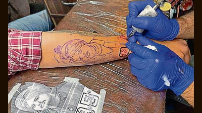 Many of the youngsters who are turning up to get tattoos of the singer said that Moose Wala inspired them through his songs, as he used to highlight the reality of the issues being faced by Punjab’s youth . (Gurpreet Singh/HT) Many of the youngsters who are turning up to get tattoos of the singer said that Moose Wala inspired them through his songs, as he used to highlight the reality of the issues being faced by Punjab’s youth . (Gurpreet Singh/HT)