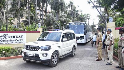 Shiv Sena MLAs being shifted from the resort to a hotel in south Mumbai on Tuesday. (PTI) Shiv Sena MLAs being shifted from the resort to a hotel in south Mumbai on Tuesday. (PTI)