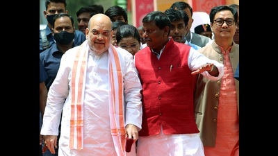 Union Home Minister Amit Shah with Union Ministers Arjun Munda and Kiren Rijiju arrives for the inauguration of the newly built National Tribal Research Institute (NTRI), at the Indian Institute of Public Administration (IIPA), in New Delhi on Tuesday. (Ayush Sharma) Union Home Minister Amit Shah with Union Ministers Arjun Munda and Kiren Rijiju arrives for the inauguration of the newly built National Tribal Research Institute (NTRI), at the Indian Institute of Public Administration (IIPA), in New Delhi on Tuesday. (Ayush Sharma)