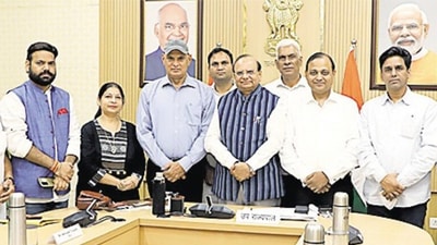Delhi LG VK Saxena with Aam Aadmi Party MLAs after a meeting on Monday. (Source: LG Delhi Twitter handle)
