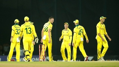 Australia's bowler Josh Hazlewood, third left, celebrates the dismissal of Sri Lanka's Bhanuka Rajapaksa (AP)