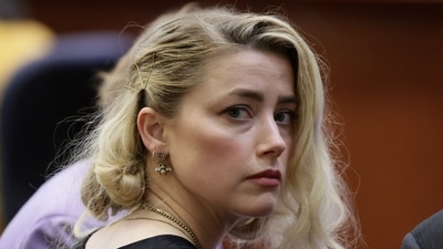 Amber Heard waits before the jury said that they believe she defamed ex-husband Johnny Depp. (Reuters) (REUTERS)