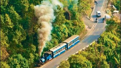 The Darjeeling Himalayan rail service zig-zags uphill from New Jalpaiguri through thick groves of pine every day before entering the hill station. (Facebook and Instagram) The Darjeeling Himalayan rail service zig-zags uphill from New Jalpaiguri through thick groves of pine every day before entering the hill station. (Facebook and Instagram)