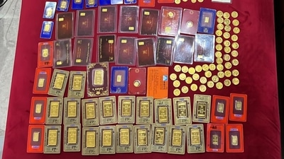 Gold coins found during the raid. (Source: ED/Twitter)