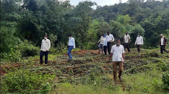 Rajendra Kachare, Bhor sub divisional officer, during a visit to Dhanavli village. (HT FILE PHOTO)