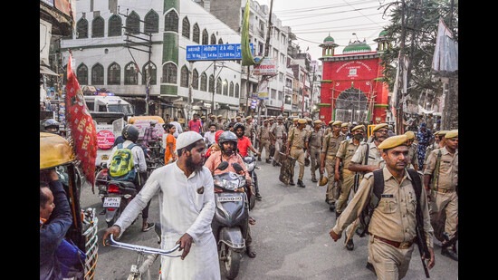 Security personnel patrol to maintain law and order as shops are reopened after violence following a controversial remark by suspended BJP leader Nupur Sharma, in Kanpur on Tuesday. (PTI)
