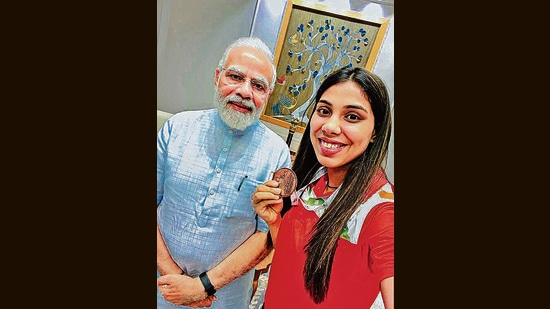 Prime Minister Narendra Modi with bronze medallist boxer Manisha Moun. (Photo: PTI) Prime Minister Narendra Modi with bronze medallist boxer Manisha Moun. (Photo: PTI)