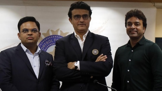 Sourav Ganguly, center, Secretary Jay Shah, left, and Treasurer Arun Dhumal stand for a photograph.(AP/File Photo)